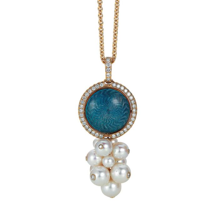 Gold pendant with blue and silver enamel on guilloche with diamonds and Akoya pearls around the rotatable middle part