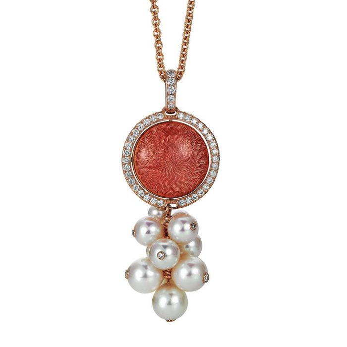Gold pendant with aubergine and red enamel on guilloche with diamonds and Akoya pearls around the turnable middle part