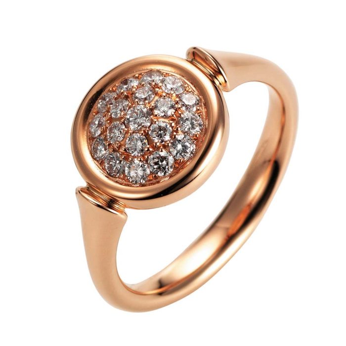 Ring aus Rosegold runder Ringkopf mit Diamanten besetzt