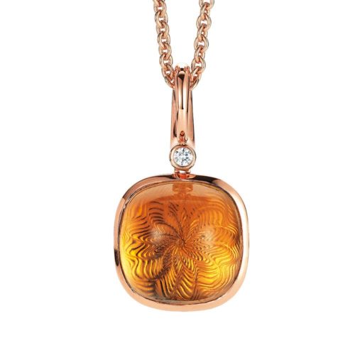 Gold pendant with yellow gemstone on guilloched surface with diamonds