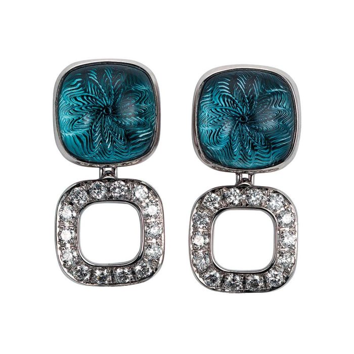 Gold earrings with blue gemstone and diamonds