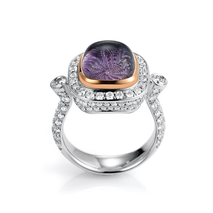 Gold ring with diamonds and purple gemstone amethyst