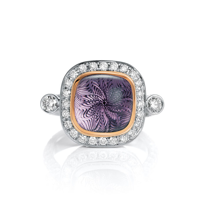 Gold ring with diamonds and purple gemstone amethyst