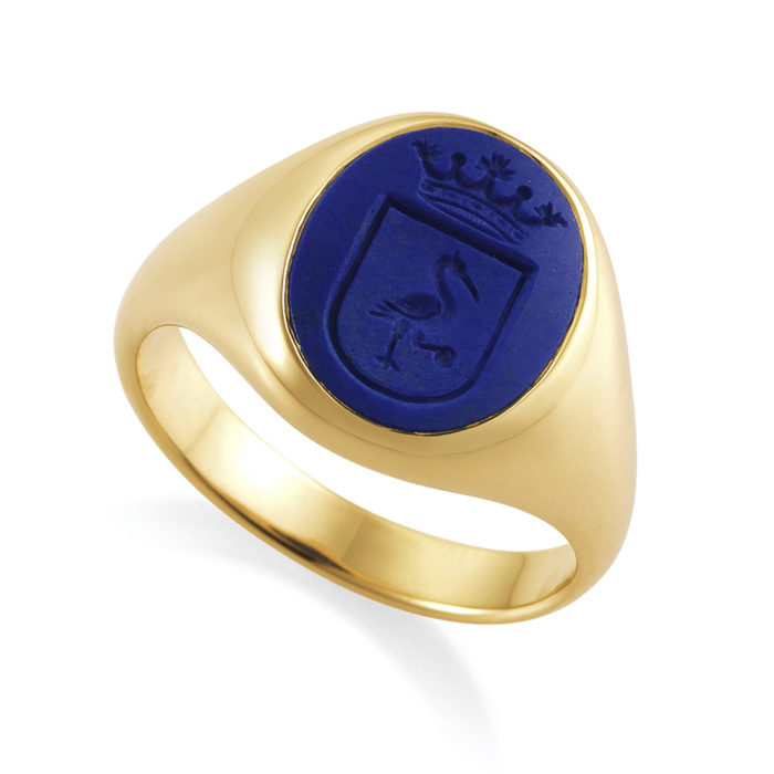 oval, rose gold signet ring with lapis lazuli with engraved shield and crown