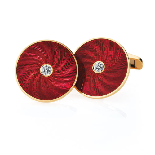 Round diamond set gold cuff links with blue vitreous guilloché enamel with a windmill pattern