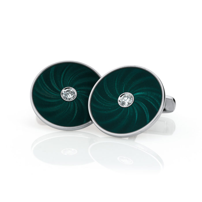 Round diamond set gold cuff links with emerald green guilloché enamel with a windmill pattern