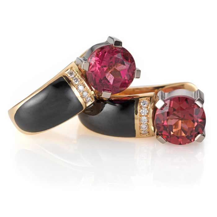 diamond-set, yellow-white-gold earrings with black guilloche enamel and rubellite