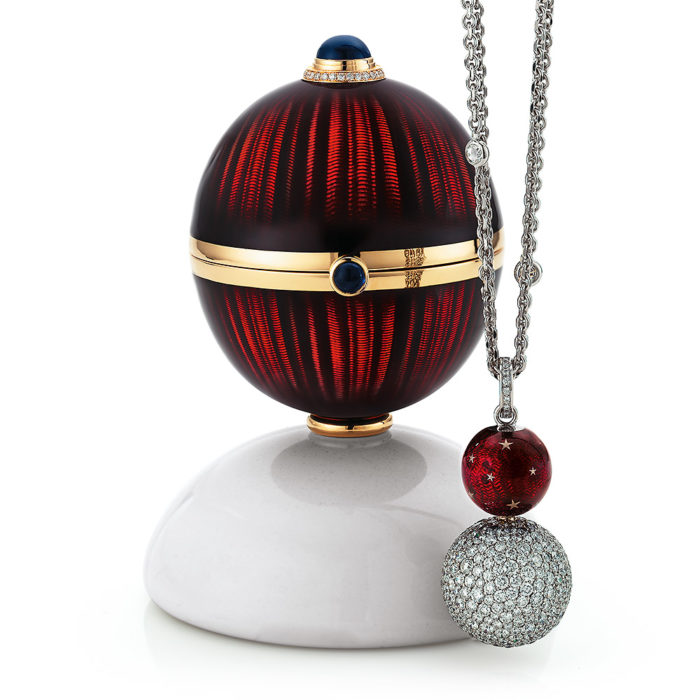 Golden egg object to open with aubergine red enamelled guilloche, diamonds, sapphires, Cocolong foot and surprise inside.