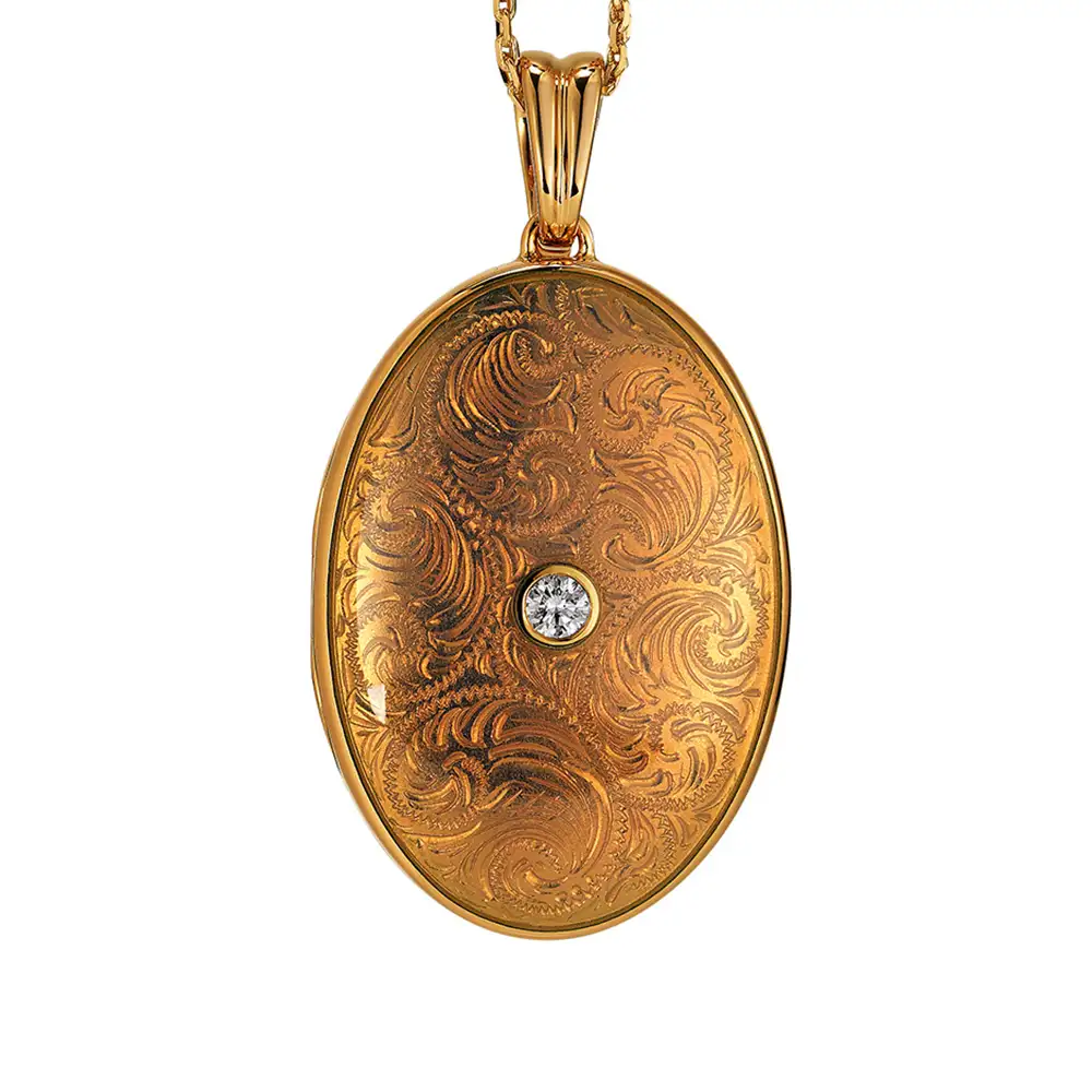Ovales Medaillon-Collier in Gelbgold, verziert mit Brillanten weiß lackiert und einer Gravur
