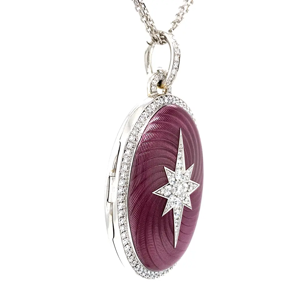 Medaillon aus Weißgold in rosa Farbe und ovaler Form verziert mit einem Kranz aus Brillanten und einem Brillanten-Stern
