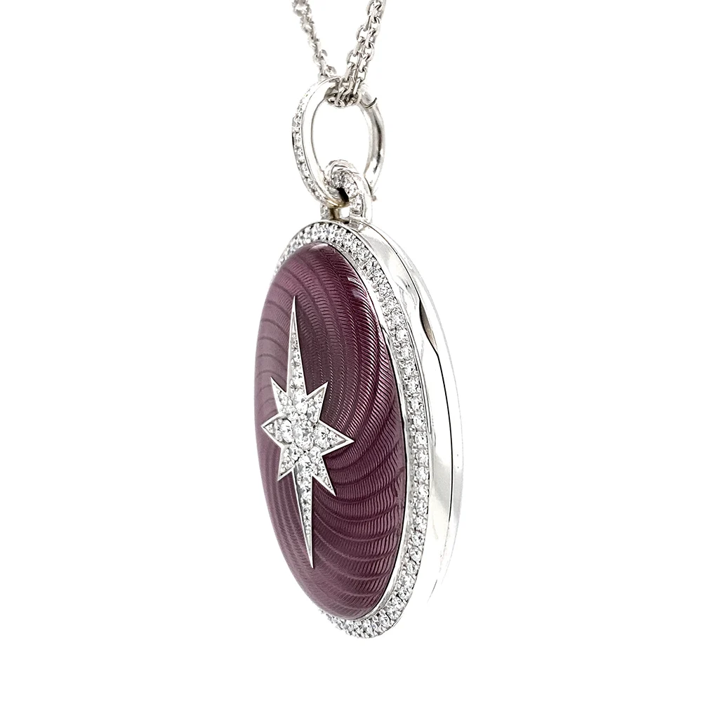 Medaillon aus Weißgold in rosa Farbe und ovaler Form verziert mit einem Kranz aus Brillanten und einem Brillanten-Stern