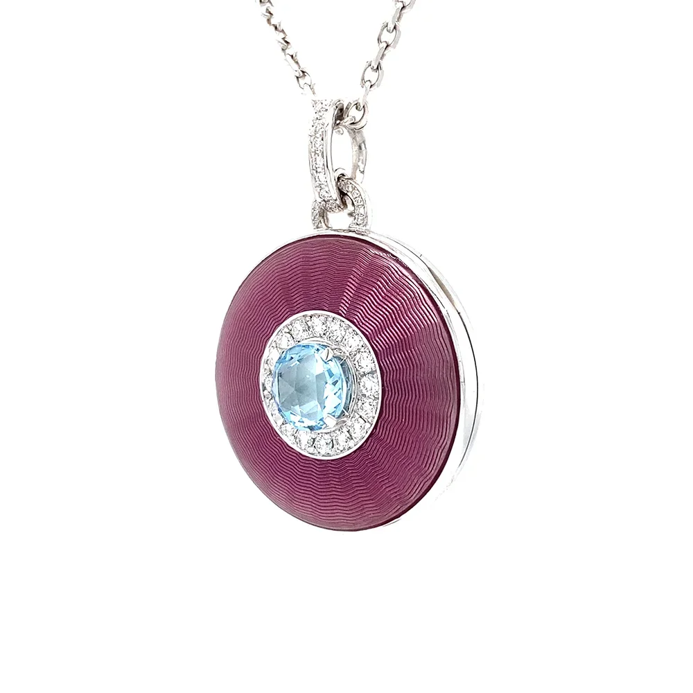 Oval pendant in white gold, with pink colour, decorated with diamonds and a blue gemstone
