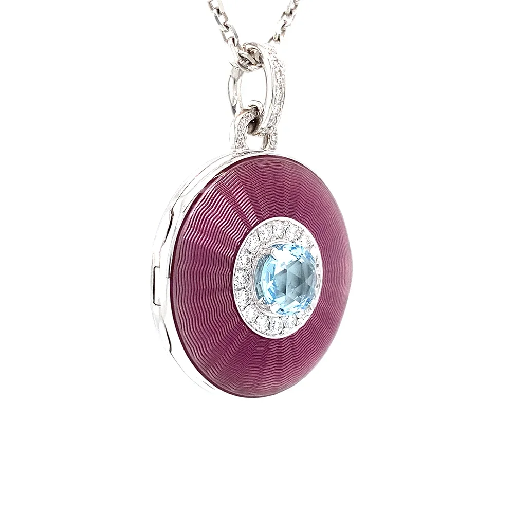 Oval pendant in white gold, with pink colour, decorated with diamonds and a blue gemstone