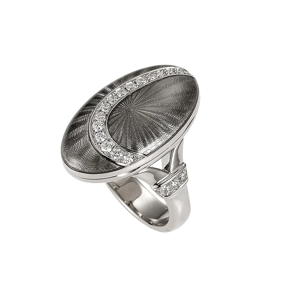 Oval ring in white gold with grey colour decorated with diamonds