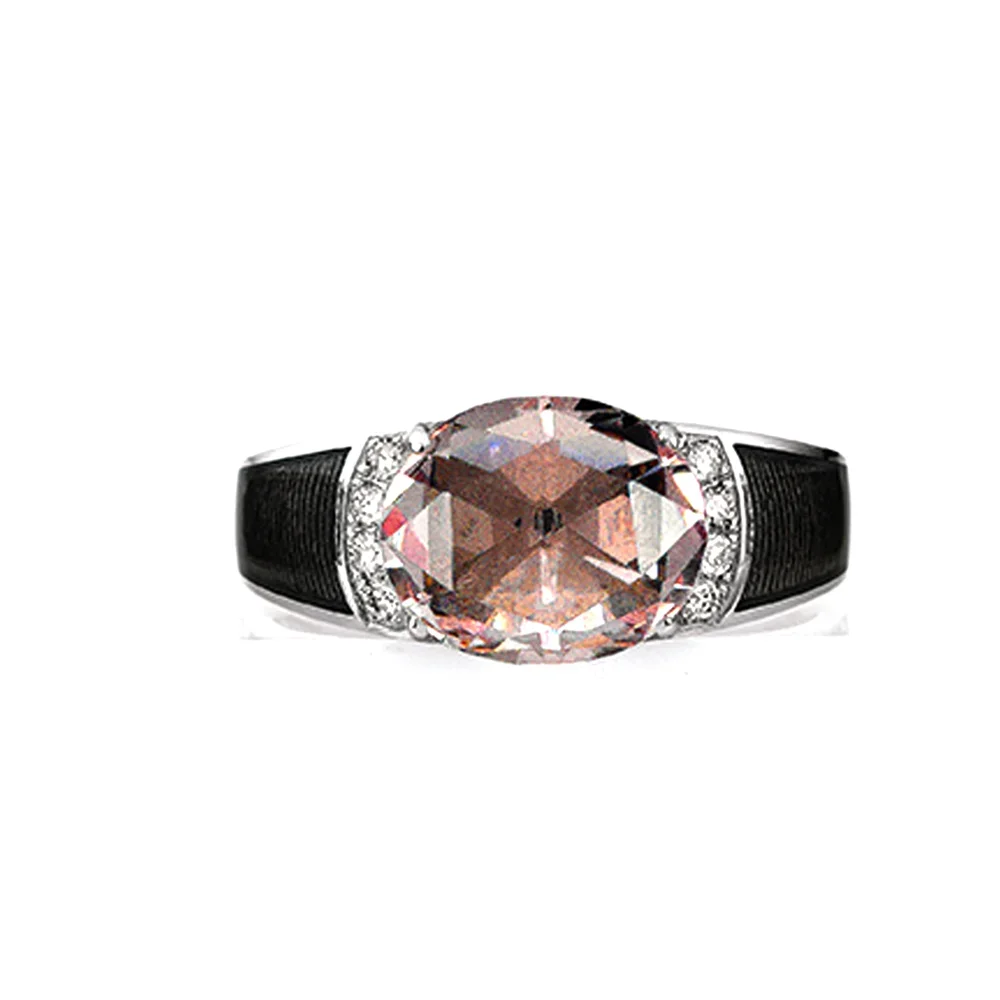 Ring aus Weißgold mit grauer Farbe verziert mit Brillanten und einem rosa Edelstein
