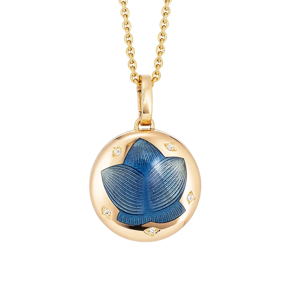 Medaillon aus Gelbgold blau gefärbt und verziert mit Brillanten