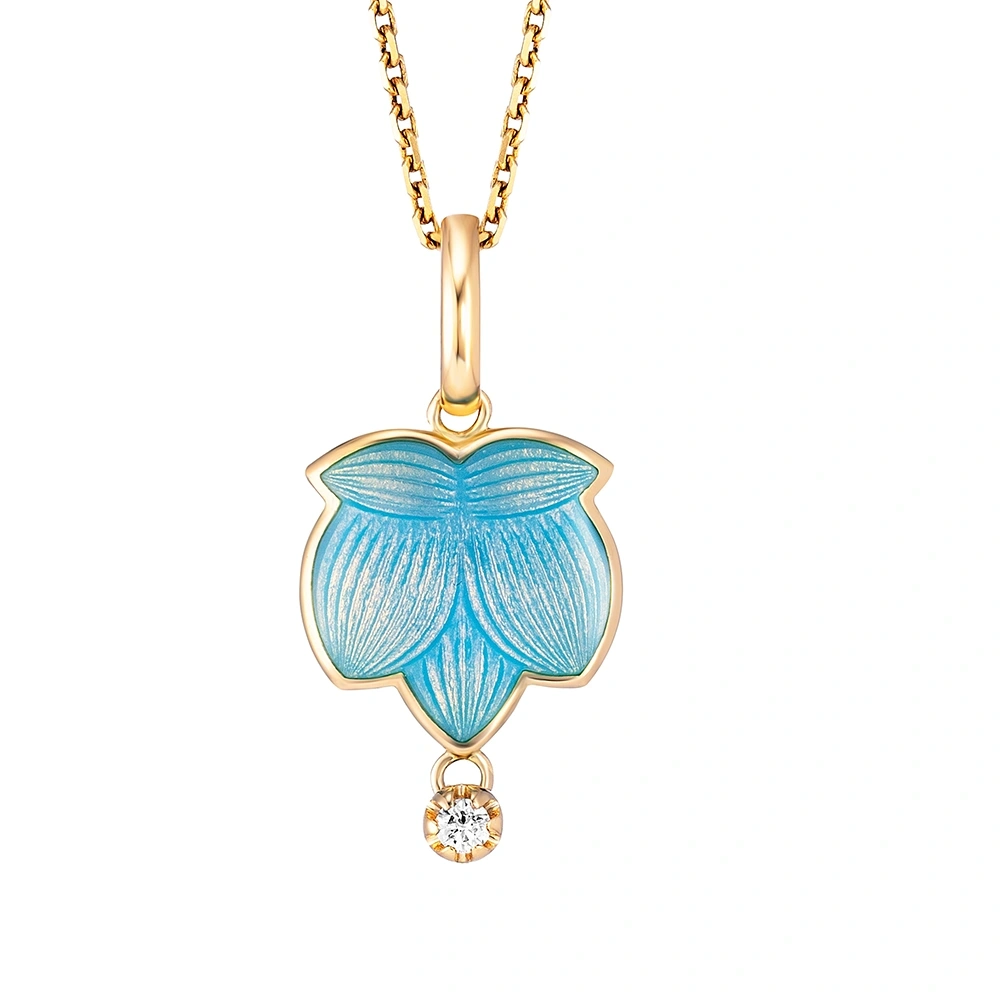 Anhänger aus Gelbgold blau gefärbt und verziert mit einem Brillanten