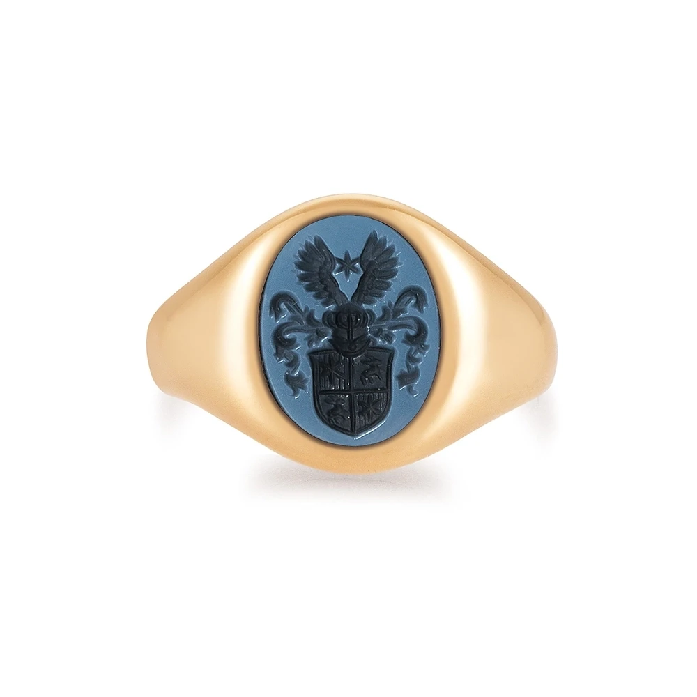 Oval signet ring in rose gold with a blue gemstone and engraving