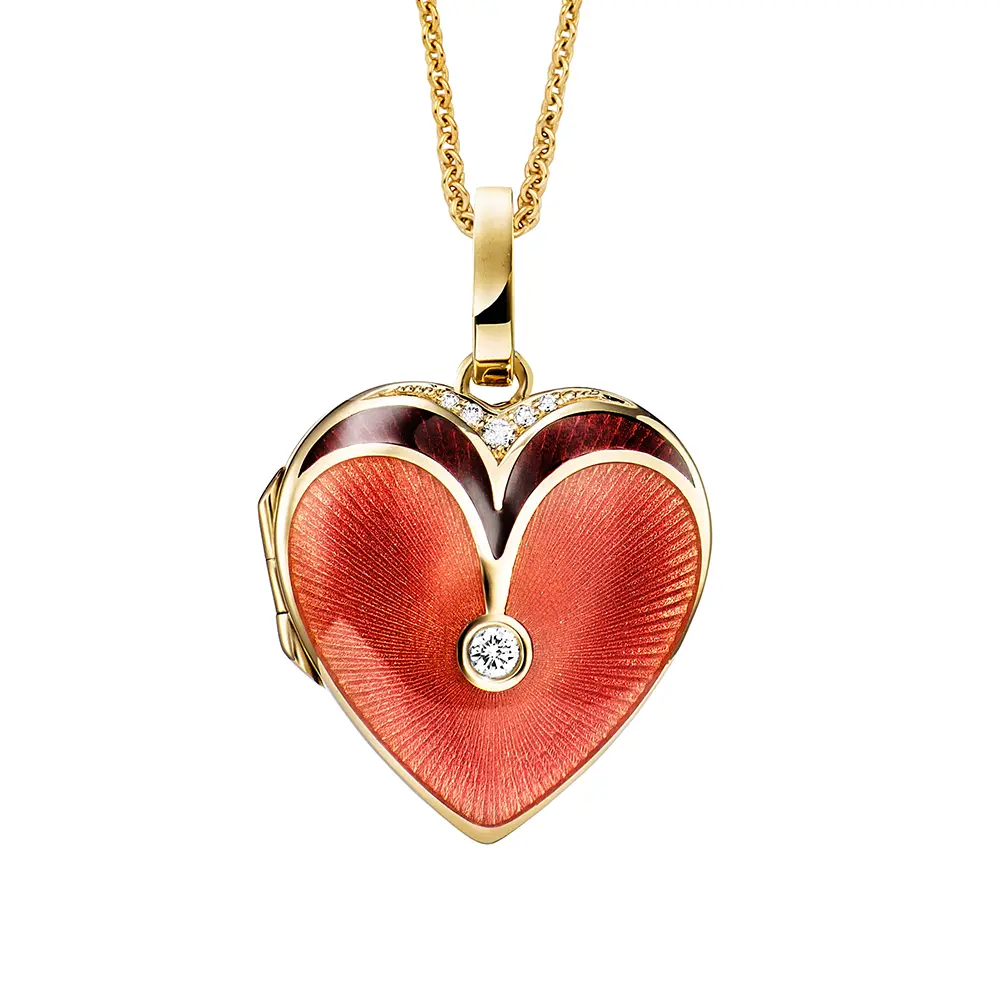 Herzförmiges Medaillon-Collier in Gelbgold, rosa lackiert und mit Brillanten besetzt