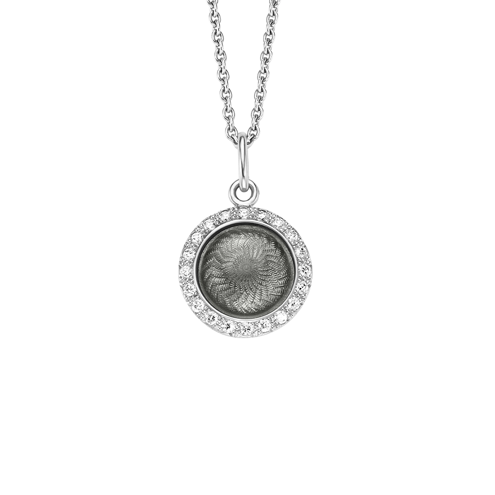 Pendant Candy in white gold with a round, slightly domed shape, light grey enamel in a windmill pattern and 20 diamonds, diameter 12.2 mm.