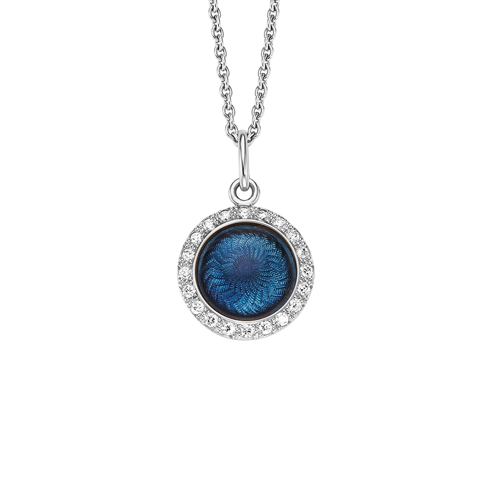 Pendant Candy in white gold with a round, slightly domed shape, petrol blue enamel in a windmill pattern and 20 diamonds, diameter 12.2 mm.