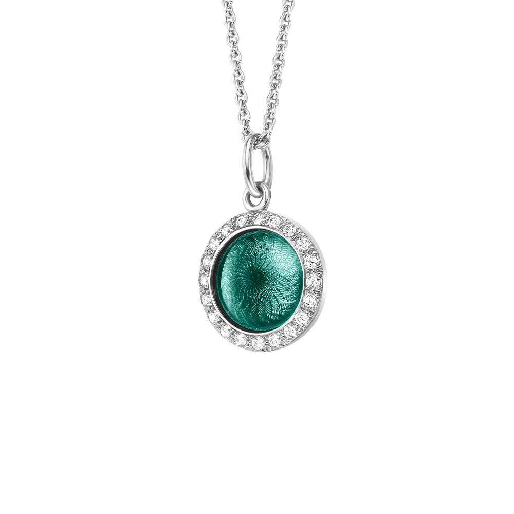 Pendant Candy in white gold with a round, slightly domed shape, emerald green enamel in a windmill pattern and 20 diamonds, diameter 12.2 mm.