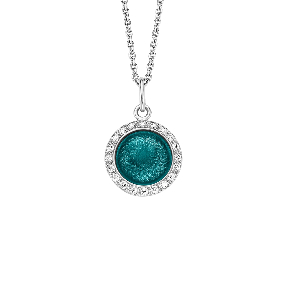 Pendant Candy in white gold with a round, slightly domed shape, turquoise enamel in a windmill pattern and 20 diamonds, diameter 12.2 mm.