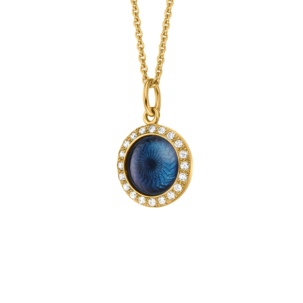 Pendant Candy in yellow gold with a round, slightly domed shape, medium blue enamel in a windmill pattern and 20 diamonds, diameter 12.2 mm.
