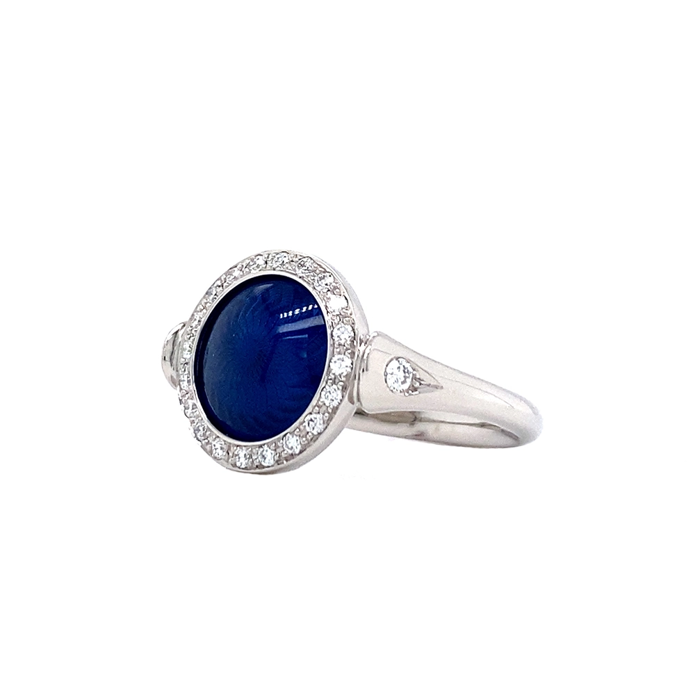 Ring Candy in white gold with a round 12.2 mm head featuring slightly domed petrol blue enamel over a windmill guilloché pattern, surrounded by 22 diamonds.