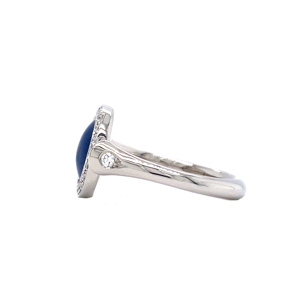 Ring Candy in white gold with a round 12.2 mm head featuring slightly domed petrol blue enamel over a windmill guilloché pattern, surrounded by 22 diamonds.