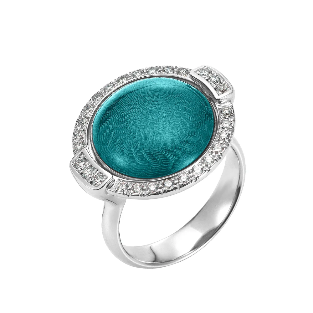 Swivel ring Candy in white gold with a round domed centre lens that can be turned to show turquoise or pink enamel, decorated with a windmill guilloché pattern and framed with 28 diamonds, 20 x 22 mm.