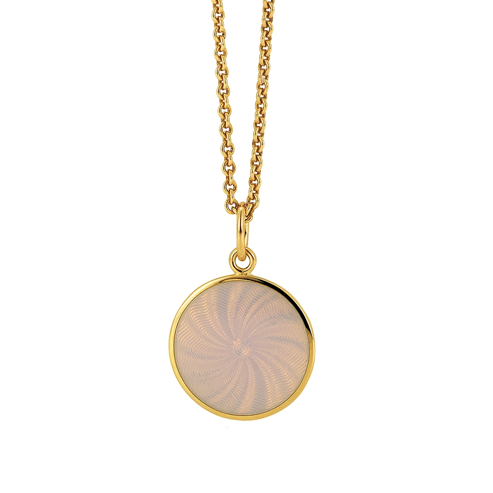 Small round pendant made of yellow gold, about the size of a small coin. The front shimmers in opalescent white, shifting colours like an opal when catching the light. A fine wave pattern appears beneath the enamel.