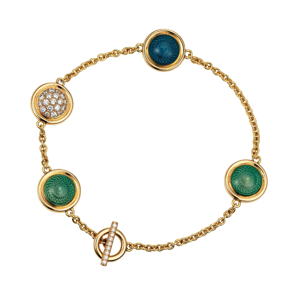 Candy bracelet in yellow gold with three double-sided, slightly domed enamel lenses in blue and turquoise over windmill guilloché, one double-sided diamond pavé lens, and a bar-and-loop closure, length 20 cm.