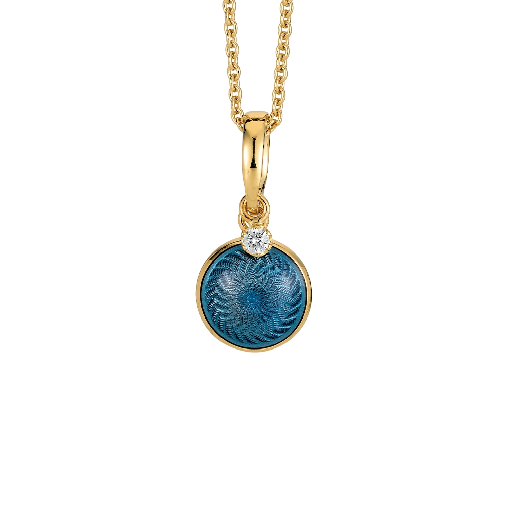 Round, slightly domed Candy pendant in yellow gold with medium blue enamel over windmill guilloché and a freely suspended diamond, diameter 10 mm.