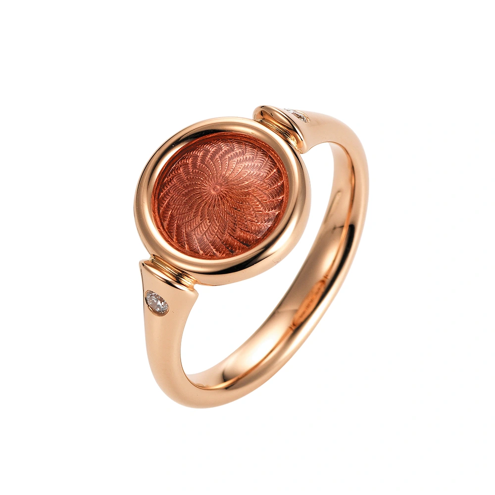 Ring Candy aus Roségold mit rundem, leicht gewölbtem Kopf, rosafarbene Emaille im Windmühlenmuster und 2 Brillanten, Durchmesser 11 mm.