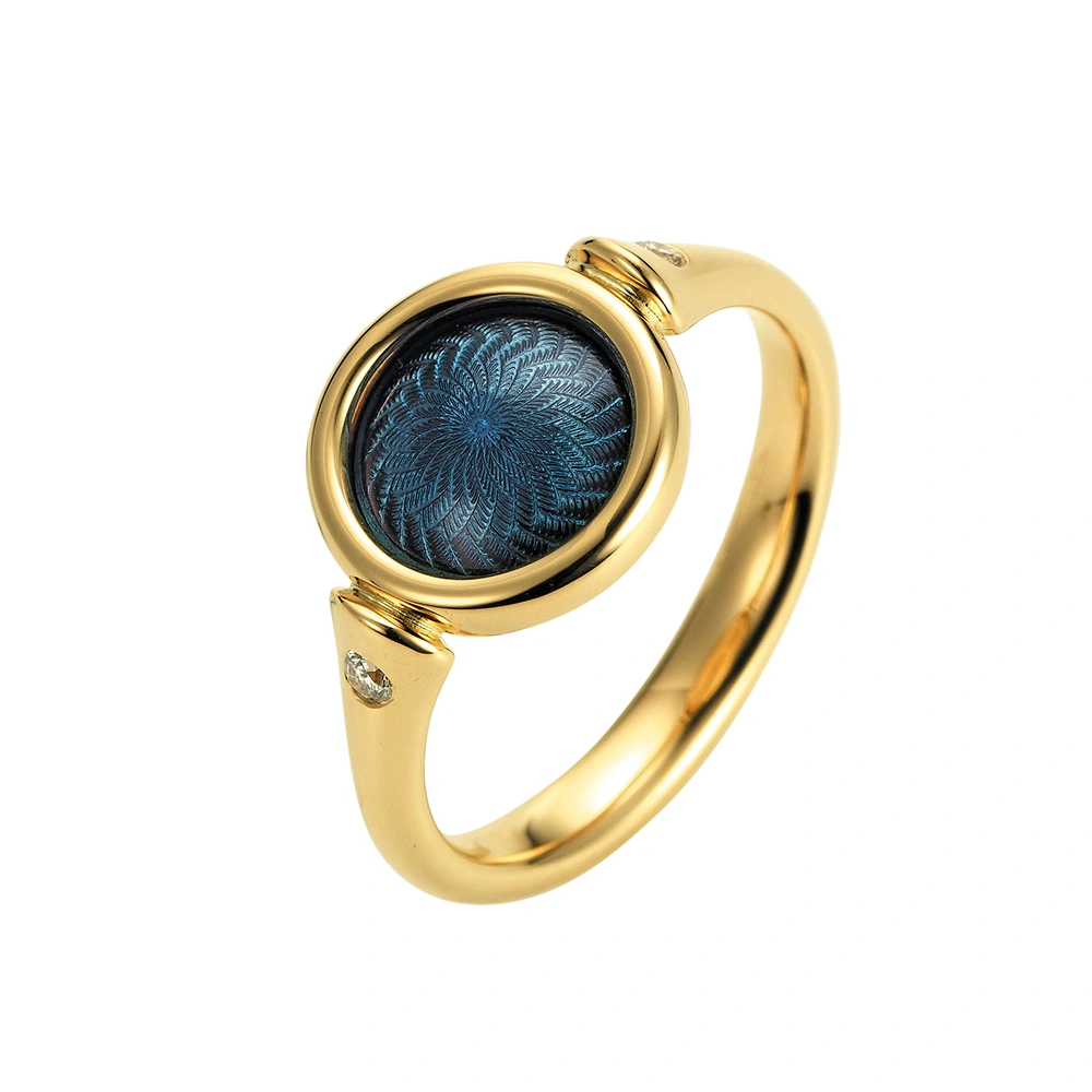 Ring Candy in yellow gold with domed, medium blue enamel surface over windmill guilloché and two diamonds set on the shank.
