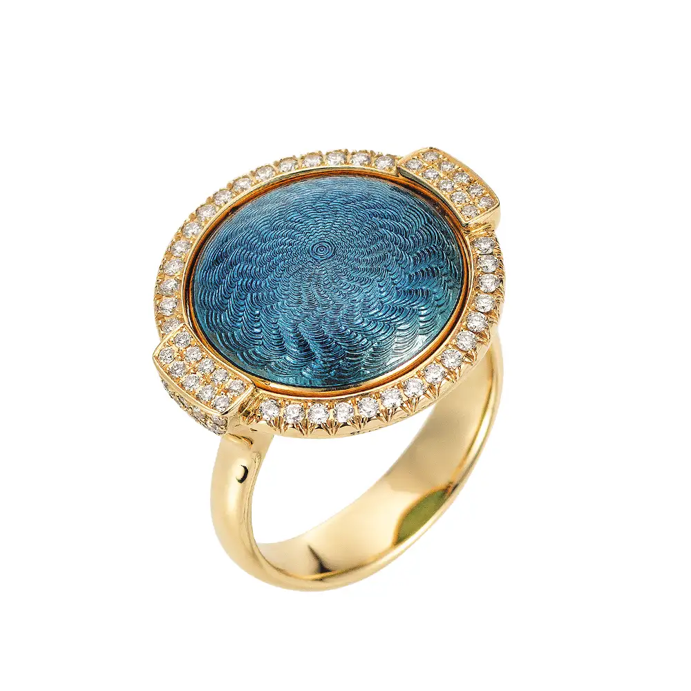Swivel ring Candy in yellow gold with a round domed centre lens that can be turned to show medium blue or light turquoise enamel, decorated with a windmill guilloché pattern and framed with 78 diamonds, 20 x 22 mm.