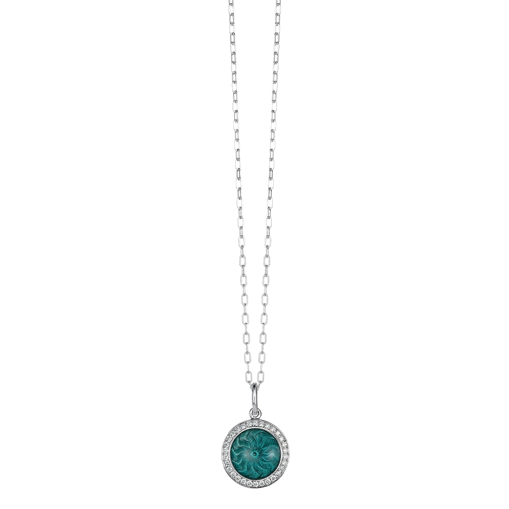 Trance pendant in 18k white gold with concave translucent turquoise enamel, windmill guilloché and 30 brilliant-cut diamonds 0.15 ct, diameter 12.5 mm, limited to 500 pieces.