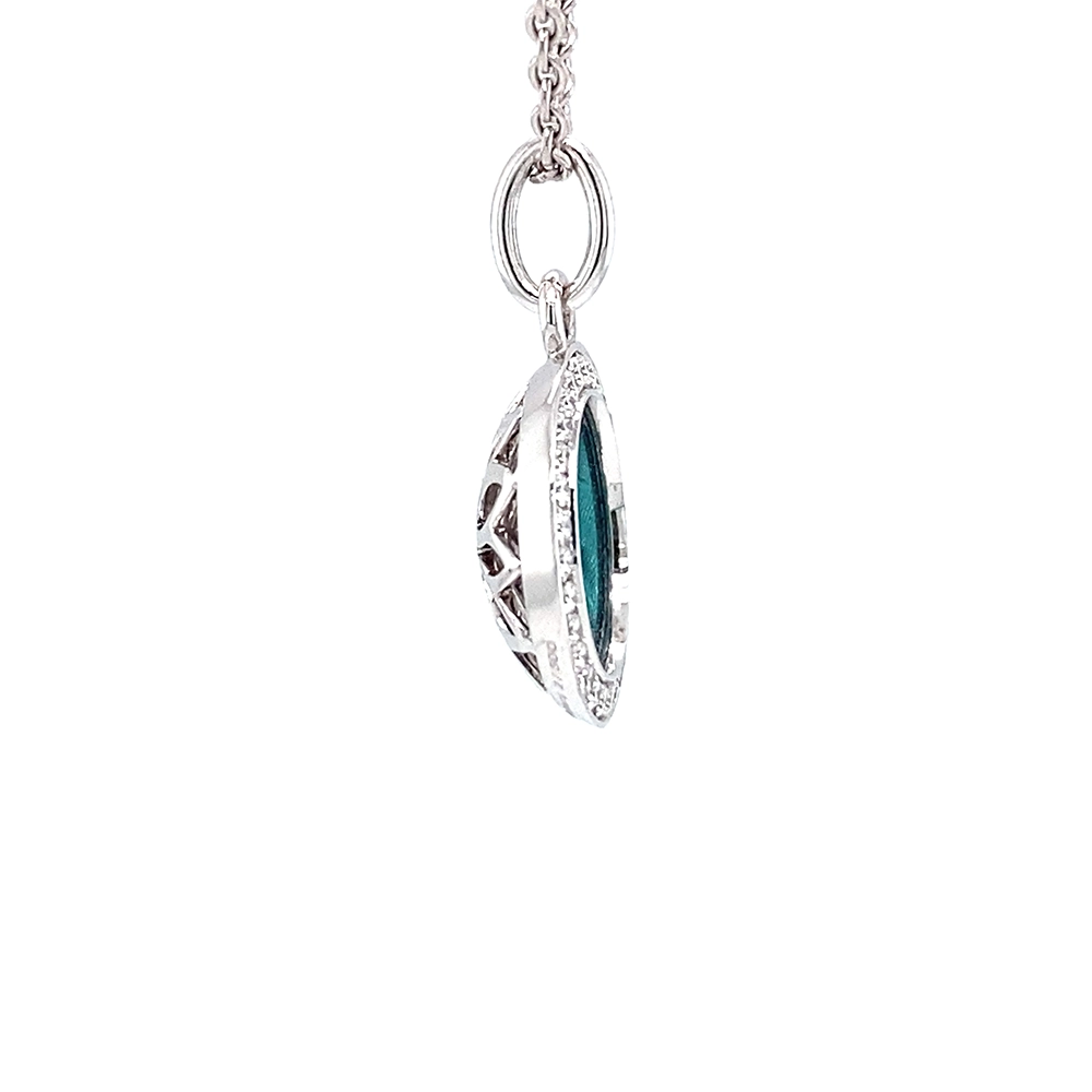Trance pendant in 18k white gold with concave translucent turquoise enamel, windmill guilloché and 30 brilliant-cut diamonds 0.15 ct, diameter 12.5 mm, limited to 500 pieces.