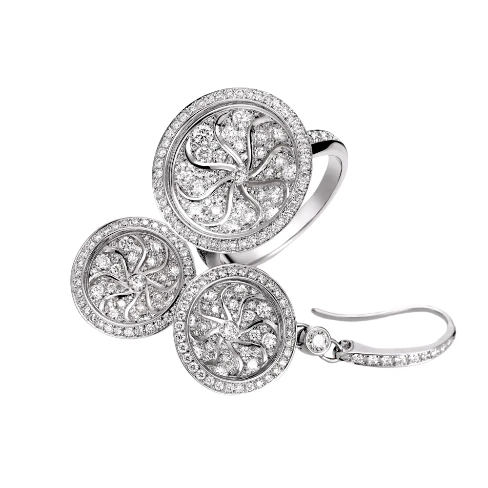Schmuckset Trance aus Weißgold mit rundem, konkavem Element, ausgeführt als Guilloché-Pavée im Windmühlenmuster, besetzt mit Diamanten, Ringkopfdurchmesser 18,4 mm. Ohrhaken-Durchmesser 14,1 mm.