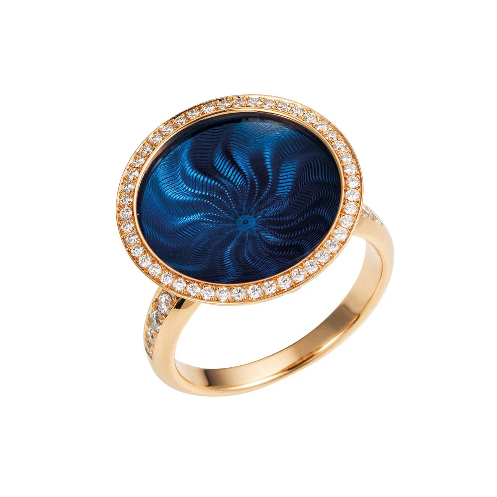 Trance ring in rose gold with white gold base, concave translucent medium blue enamel over windmill guilloché and a surrounding diamond circle, diameter 18.4 mm.
