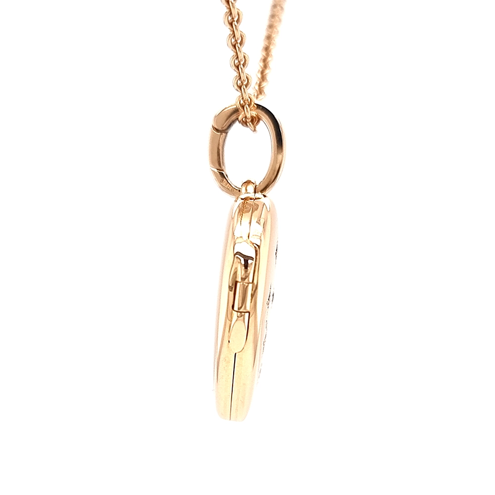 Heart shaped locket necklace in rose gold, decorated with diamonds