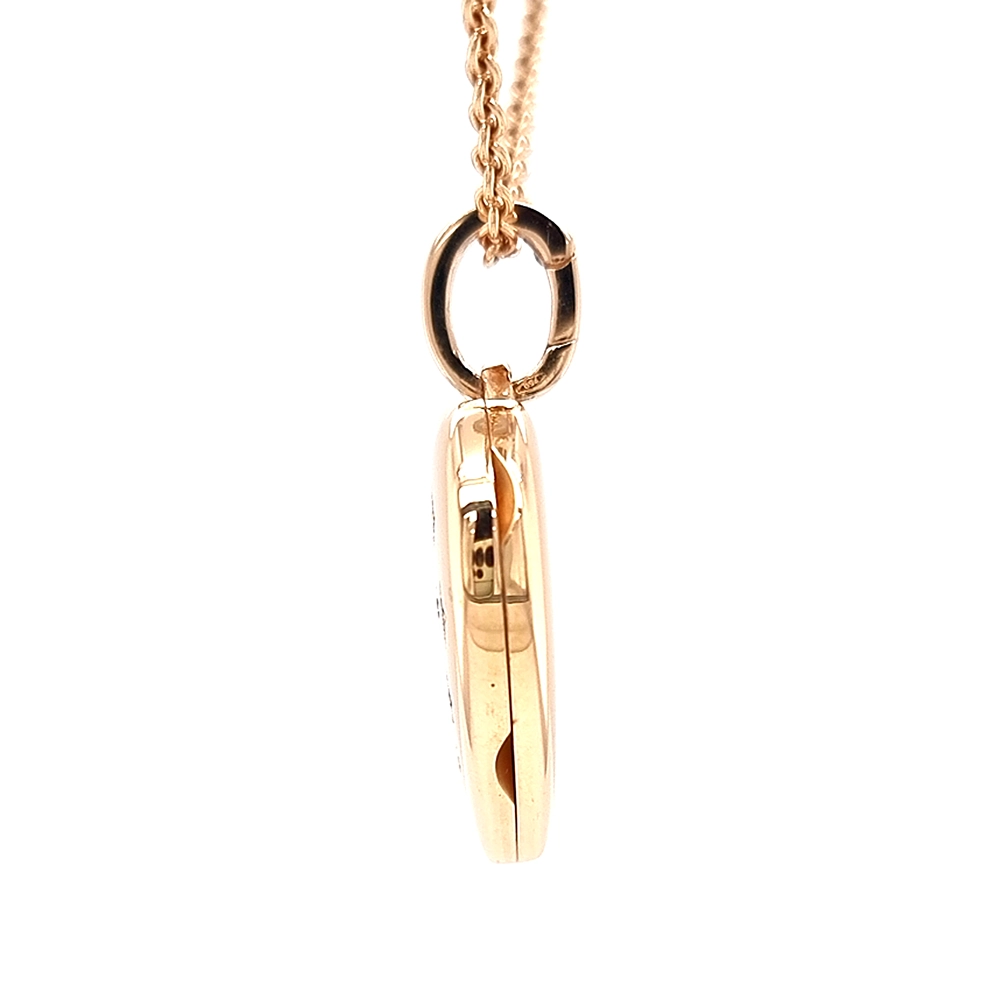 Heart shaped locket necklace in rose gold, decorated with diamonds
