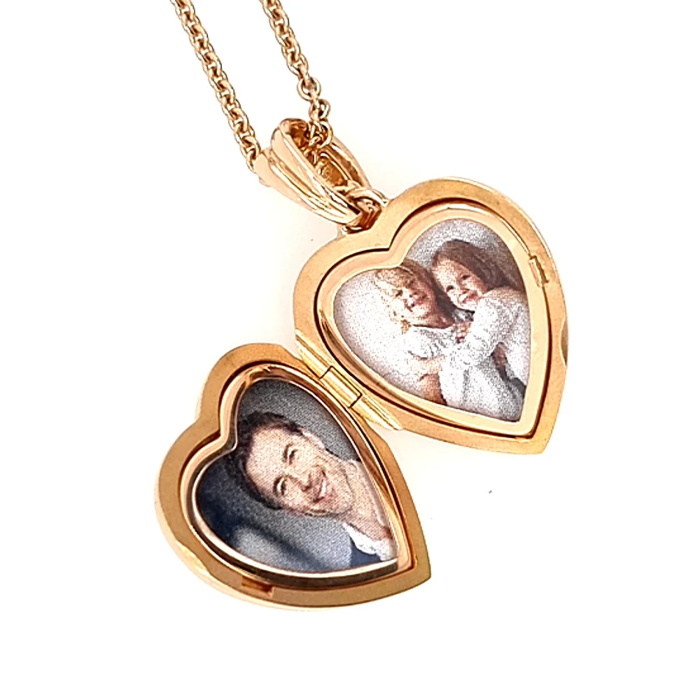 Herzförmiges Medaillon-Collier in Roségold mit einem Brillant