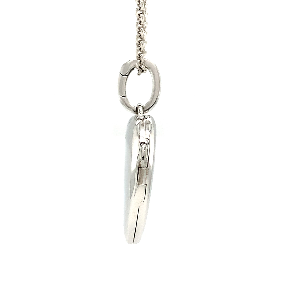 Heart shaped locket necklace in white gold