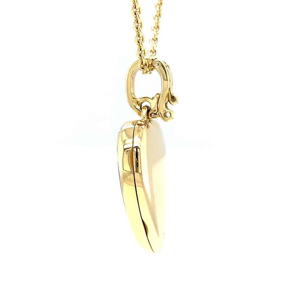Herzförmiges Medaillon-Collier aus Gelbgold, dunkelblau lackiert und mit Brillanten besetzt
