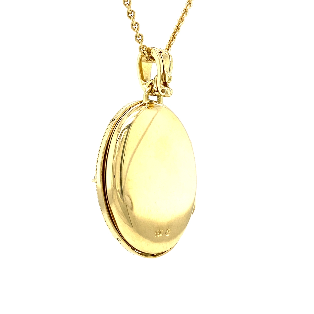 Ovales Medaillon-Collier in Gelbgold, hellblau lackiert und mit Brilllanten bestezt