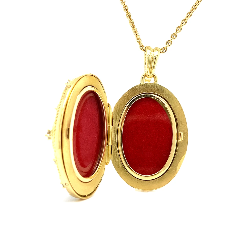 Ovales Medaillon-Collier in Gelbgold, hellblau lackiert und mit Brilllanten bestezt