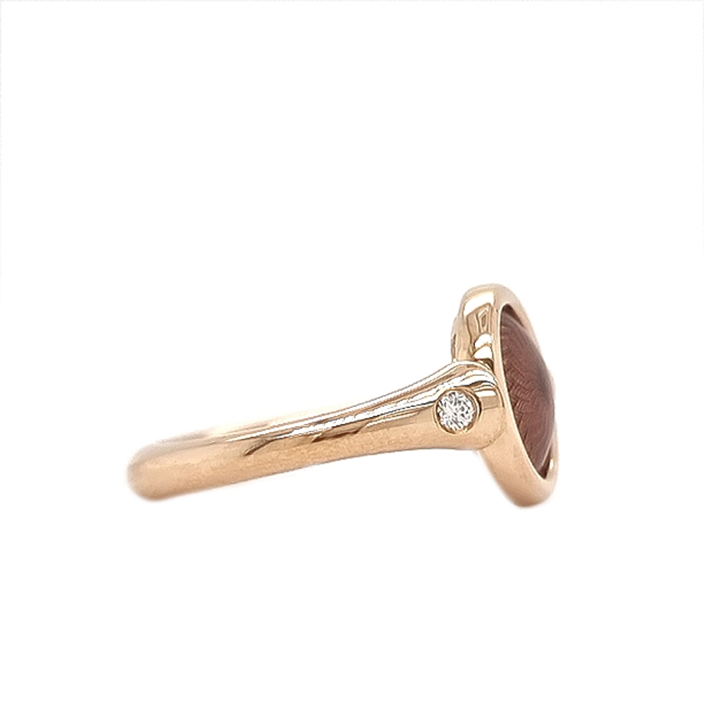 Ring Candy aus Roségold mit rundem, leicht gewölbtem Kopf, purpurfarbene Emaille im Windmühlenmuster und 2 Brillanten, Durchmesser 11 mm.
