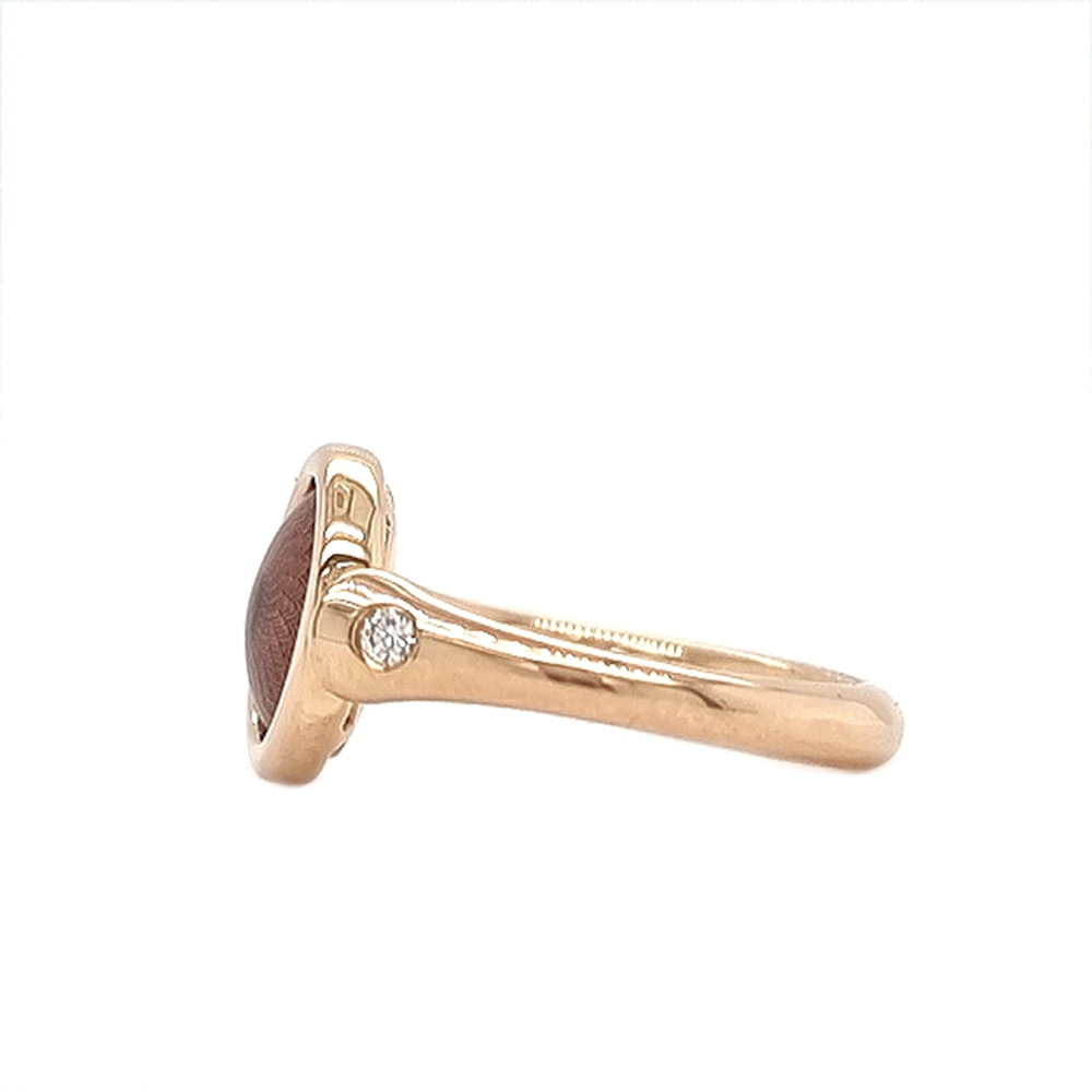 Ring Candy aus Roségold mit rundem, leicht gewölbtem Kopf, purpurfarbene Emaille im Windmühlenmuster und 2 Brillanten, Durchmesser 11 mm.